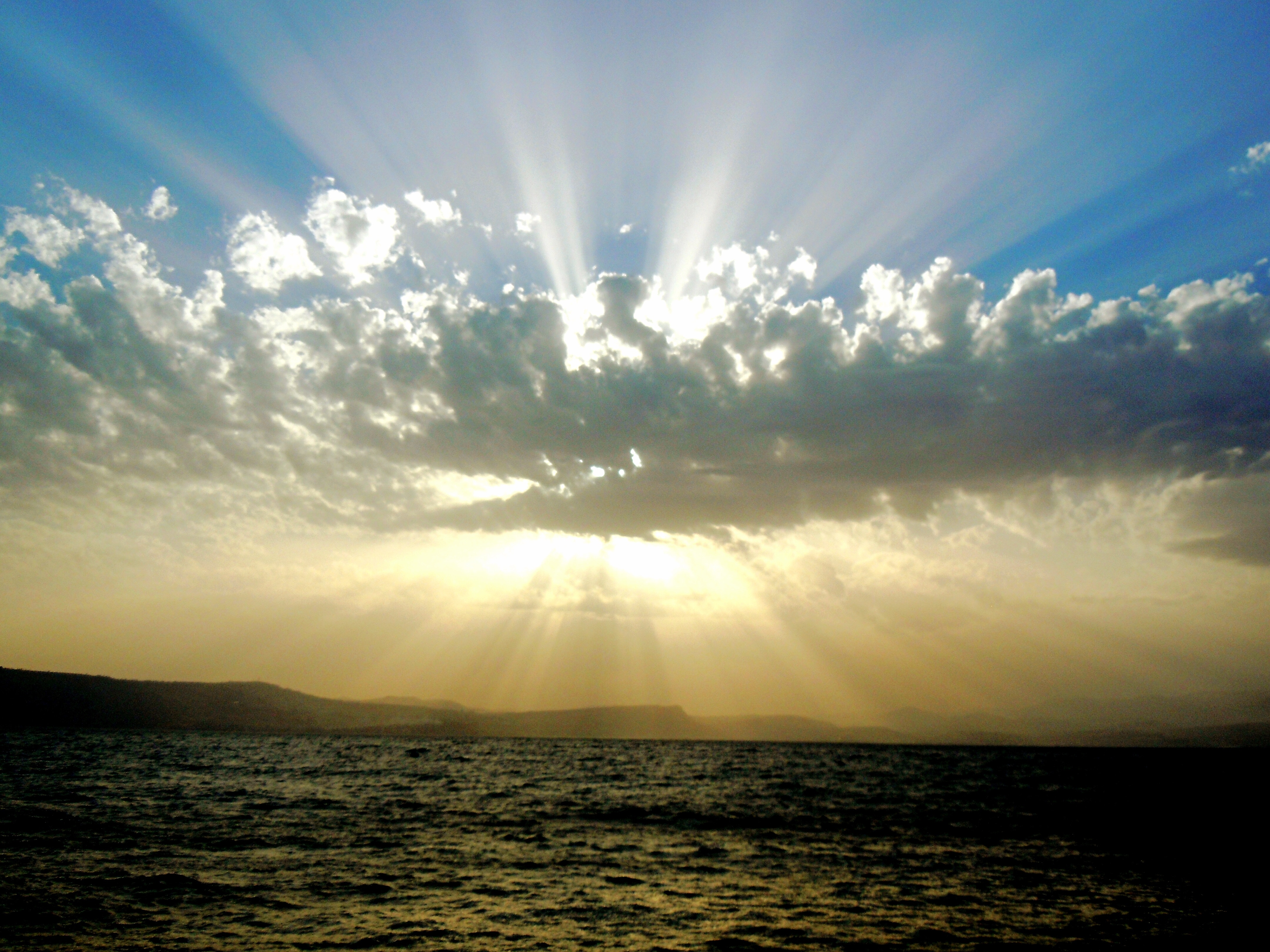 sun breaking throuhg the clouds
