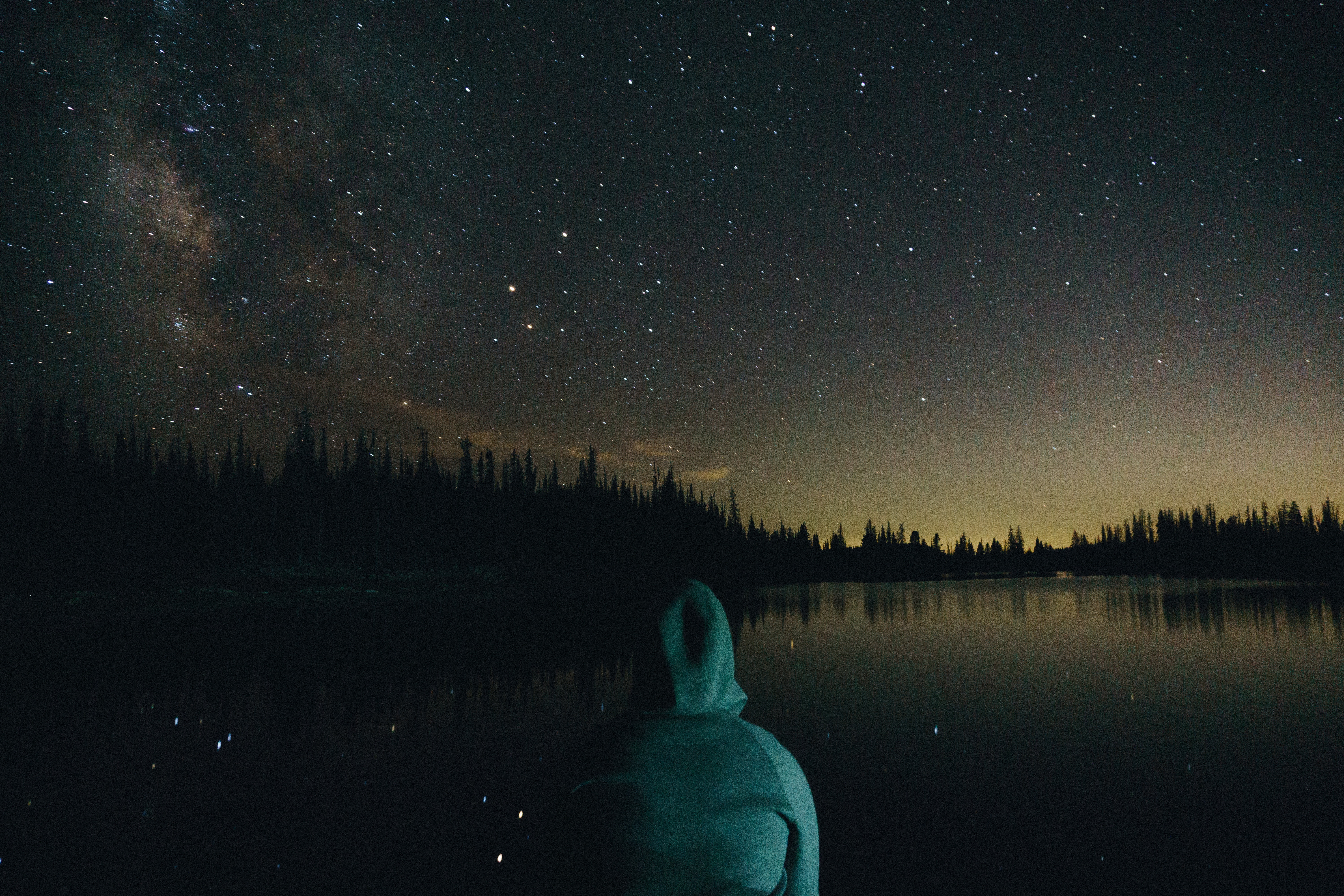 a young men looking up to the stars